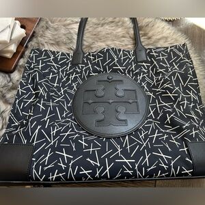 Tory Burch  tote holds a lab top and good for mother expecting a baby